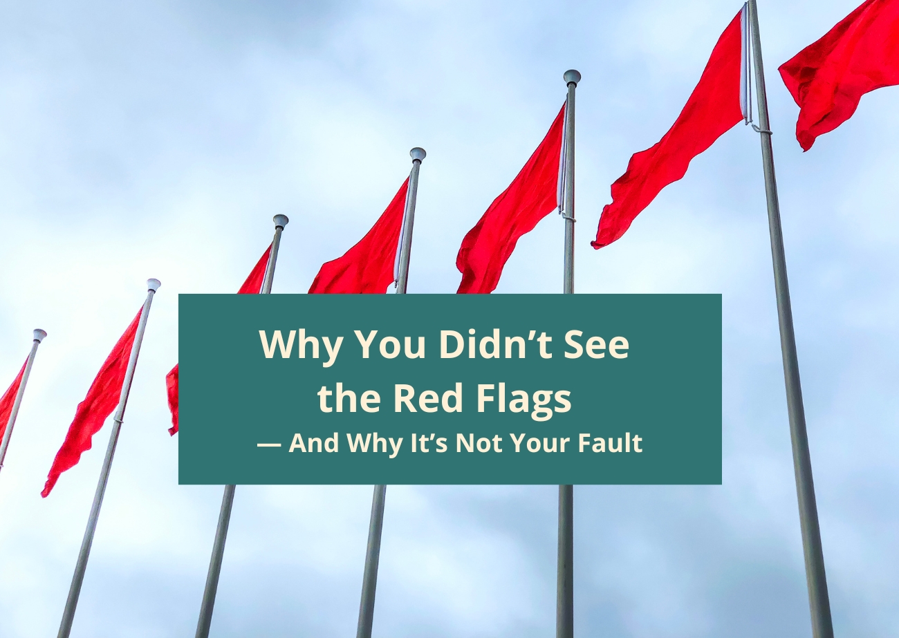Red flags on tall flagpoles against a bright sky, symbolizing overlooked warning signs in an abusive or unsafe marriage.